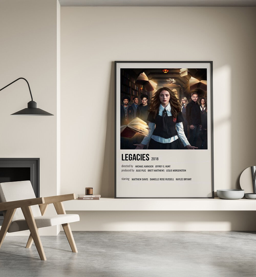 Legacies 2018 Movie Posters in Black Plain Frame place on a wall behind a chair beside lamp