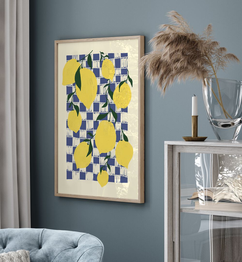 Lemons by Studio Dolci Kitchen Art Prints in Oak Wood Plain Frame placed on a wall beside a sofa