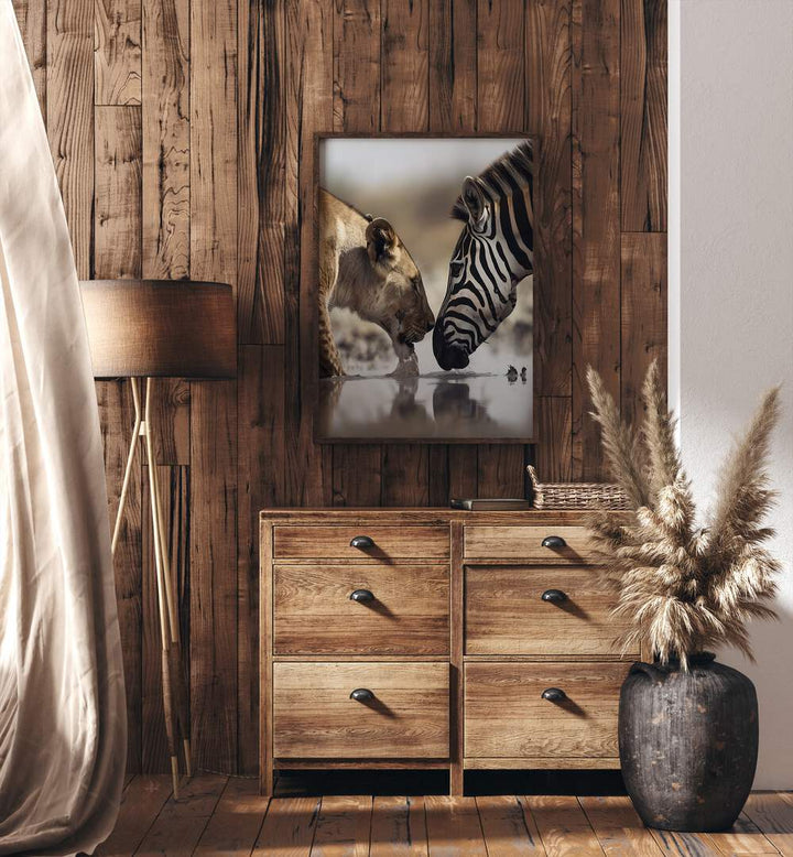 Leopard And Zebra Wildlife Posters in Dark Wood Plain Frame Placed on a Wooden Textured Wall Above a Console Table In the Bed Room