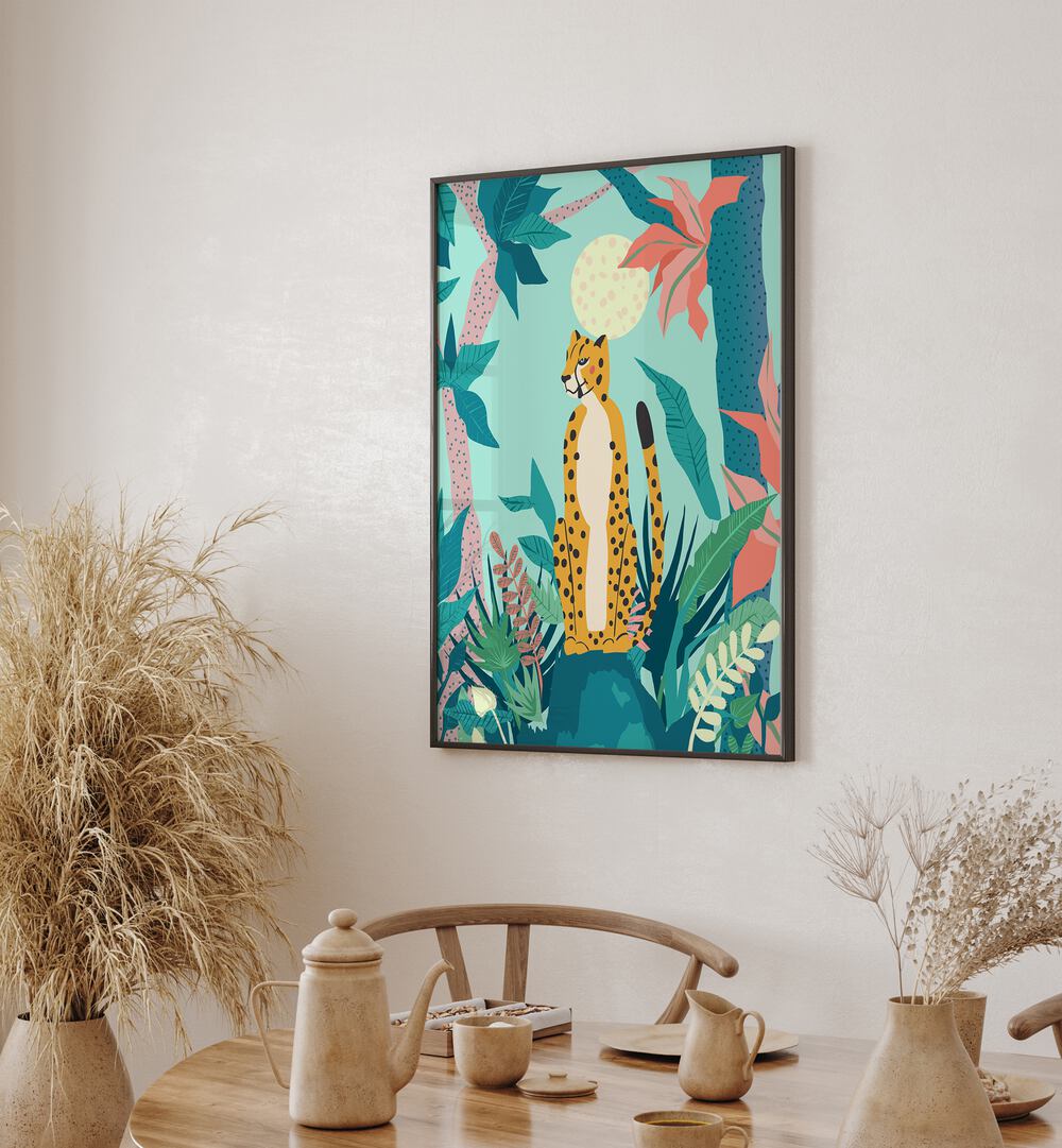 Leopard Forest By Uma Gokhale Wildlife Art Prints in Black Plain Frame on a beige wall behind a dining table