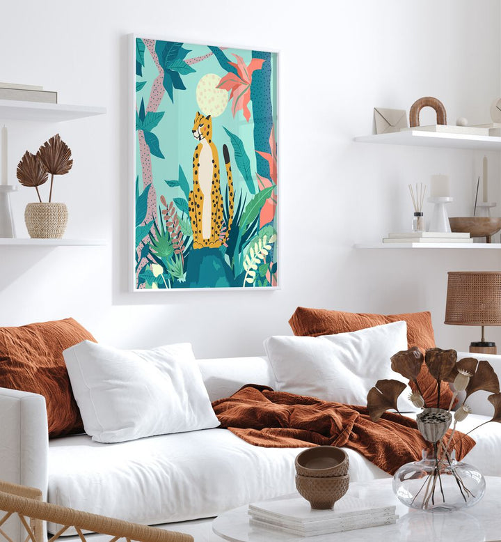 Leopard Forest By Uma Gokhale Wildlife Art Prints in White Plain Frame on a white wall behind a sofa for living room