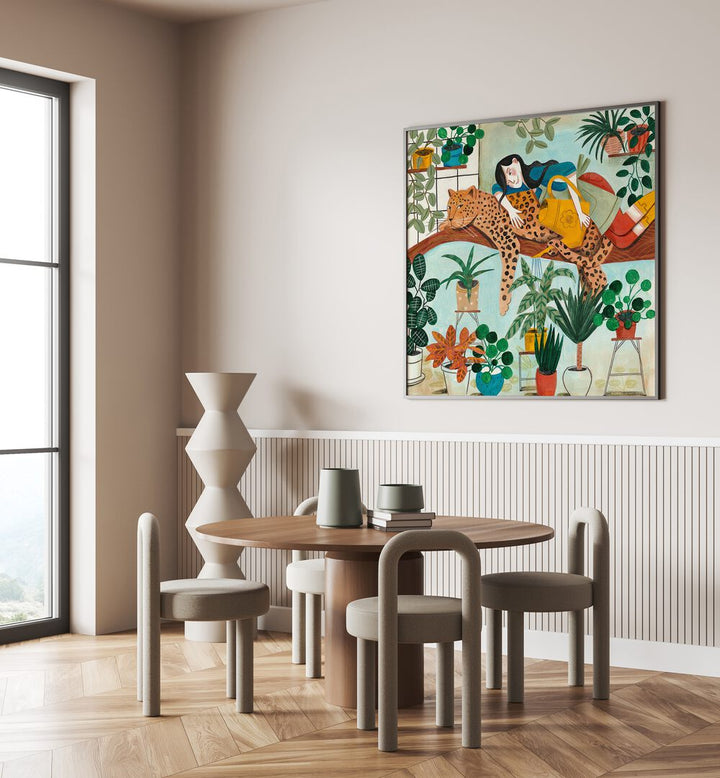 Leopard and Gardening By Caroline Bonne Muller Woman Illustration Paintings in Black Plain Frame on a white wall behind a dining table for dining room