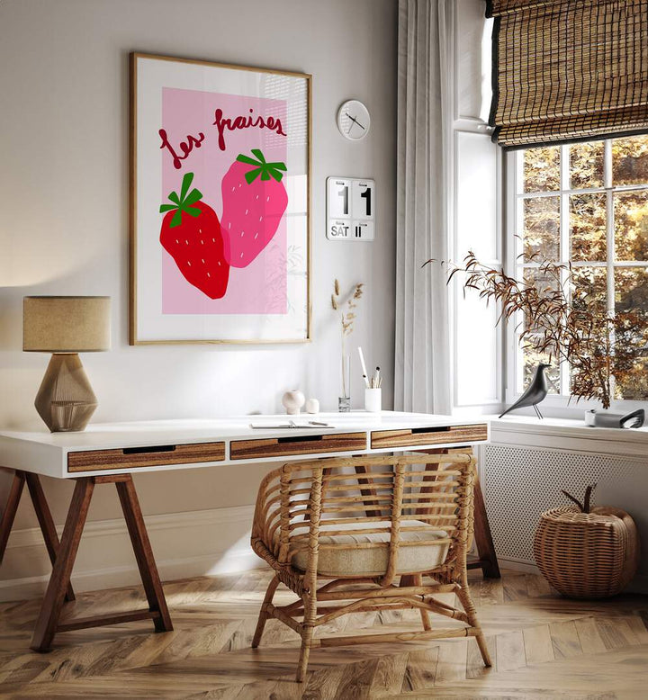 Les Fraises by Athene Fritsch Kitchen Posters Kitchen Art Prints in Oak Wood Plain Frame placed on a wall behind a study table and beside a window