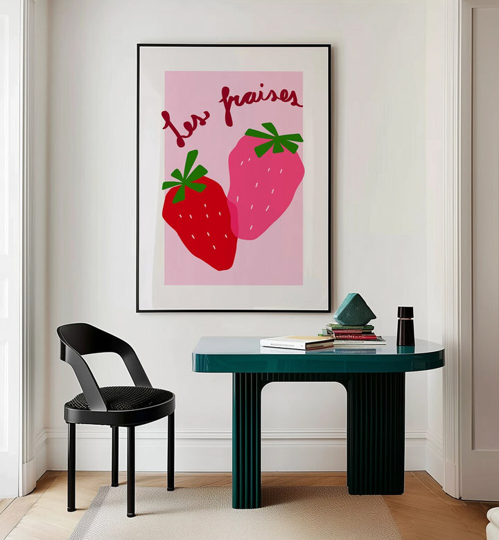 Les Fraises by Athene Fritsch Kitchen Posters Kitchen Art Prints in Black Plain Frame placed on a wall behind a study table