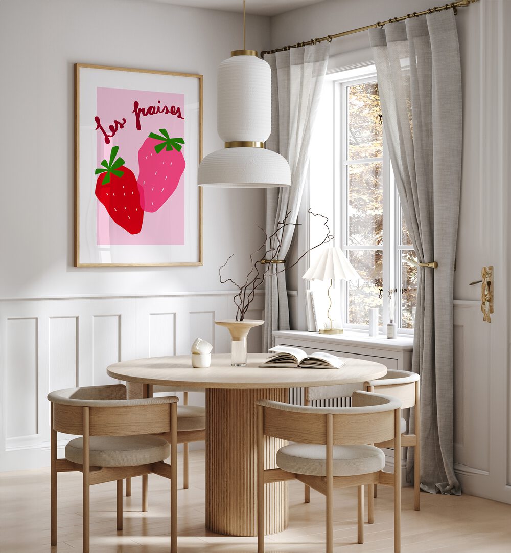 Les Fraises by Athene Fritsch Kitchen Posters Kitchen Art Prints in Oak Wood Plain Frame placed on a wall in a dining room area beside a window and behind a dining table