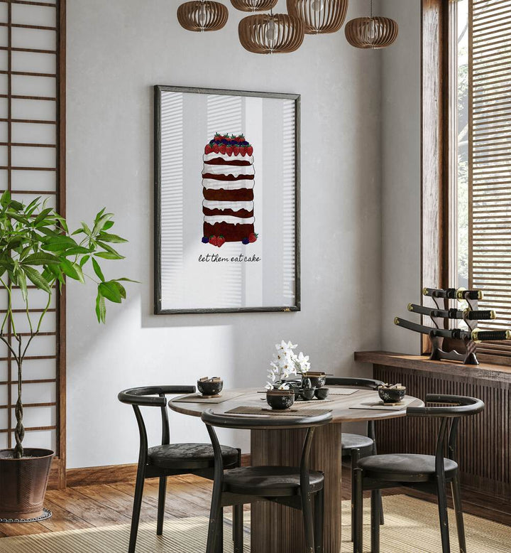 Let Them Eat Cake By Orara Studio Kitchen Posters Kitchen Art Prints in Dark Wood Plain Frame placed on a White Colored Wall near a Dining Table in the Dining Room