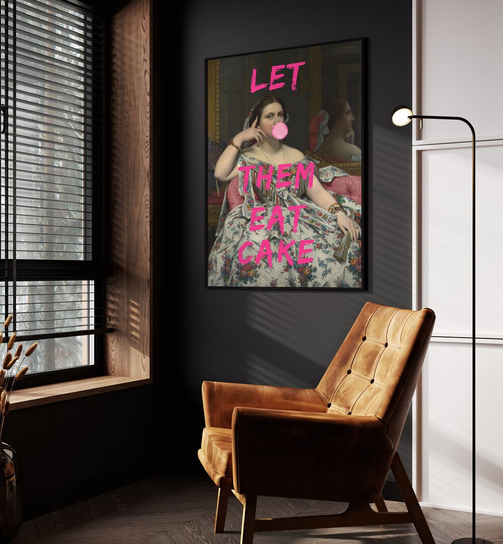 Let Them Eat Cake by the Art Concept Altered Art Prints in Black Plain Frame placed on a wall beside an orange sofa