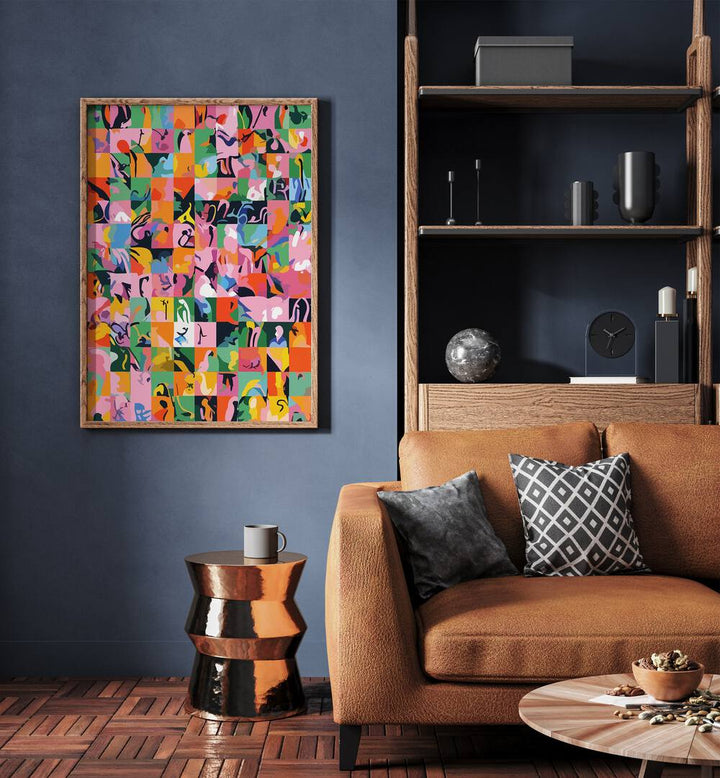 Life On A Checkboard By Uma Gokhale Abstract Paintings in Oak Wood Plain Frame on a blue wall beside an orange sofa