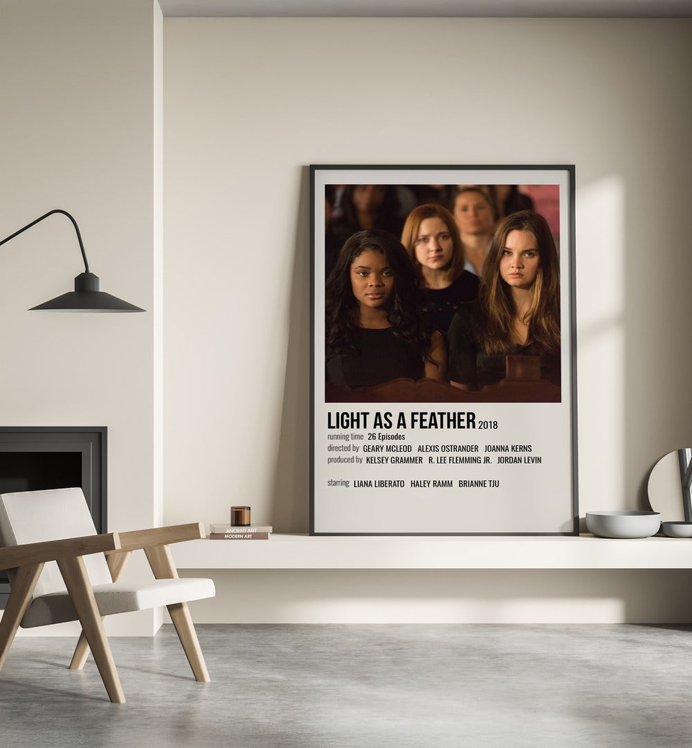 Light As Feather 2018 Movie Posters in Black Plain Frame place on a wall behind a chair beside lamp