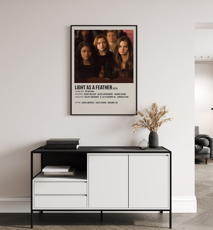 Light As Feather 2018 Movie Posters in Black Plain Frame hanging on wall above console table