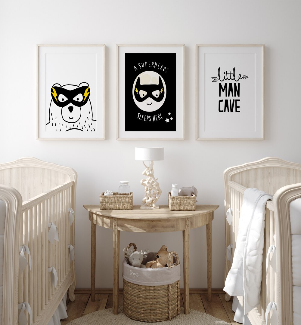 Little Man Cave Set Of 3 Paintings in White Frame With Mount placed on a wall behind kids bed for kids room