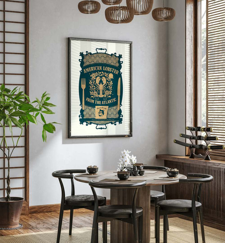 Lobster Baroque by Studio Mandariini Kitchen Posters Kitchen Art Prints in Black Plain Frame placed on a wall in a dining room area beside a window and behind a dining table