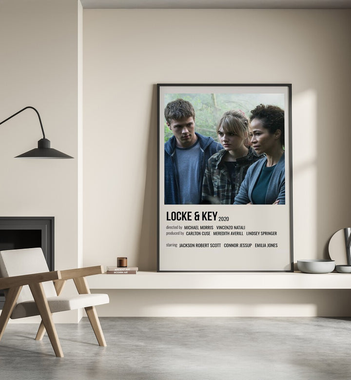Locke Key 2020 I Movie Posters in Black Plain Frame place on a wall behind a chair beside lamp