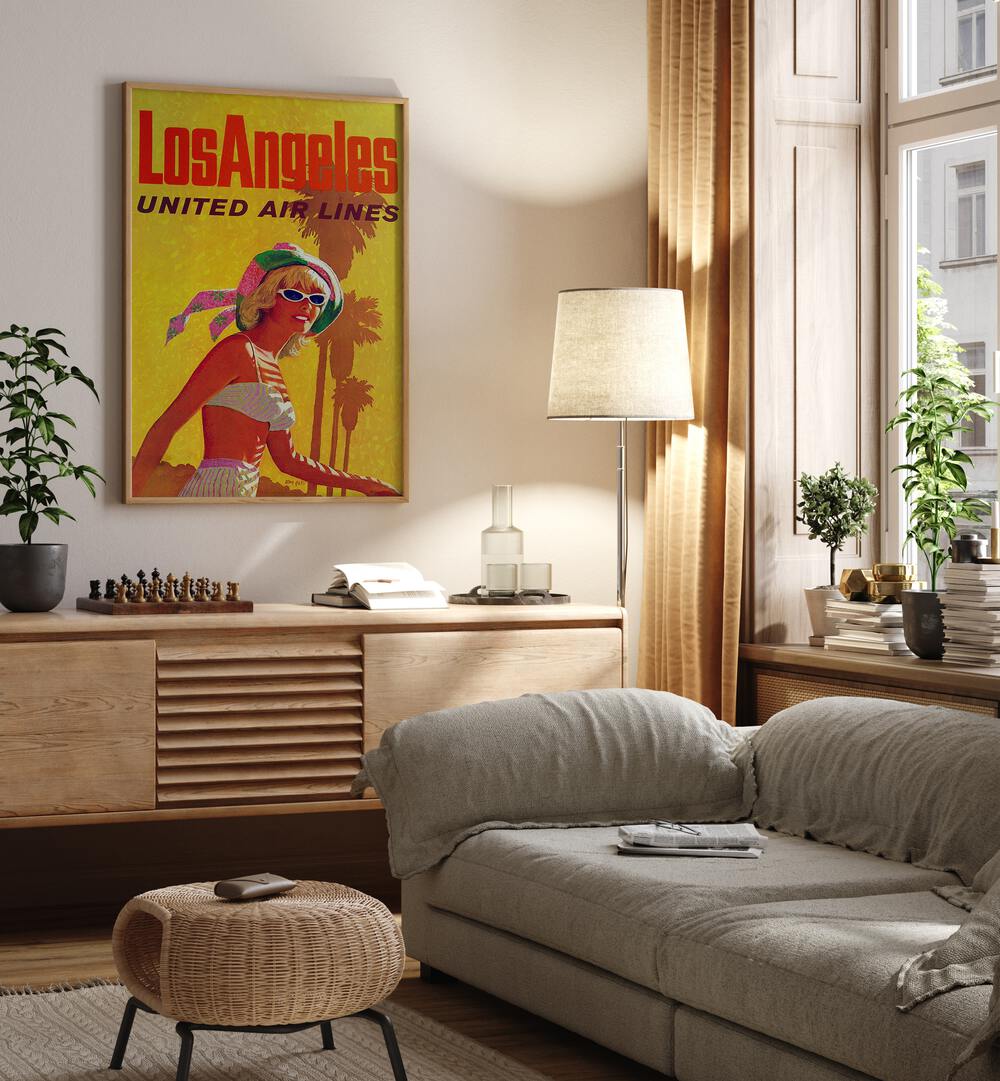 Los Angeles-United Air Lines  Travel Posters in Oak Wood Plain Frame placed on a wall behind a console table 