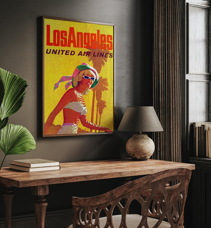 Los Angeles-United Air Lines  Travel Posters in Dark Wood Plain Frame placed on a wall behind a study table