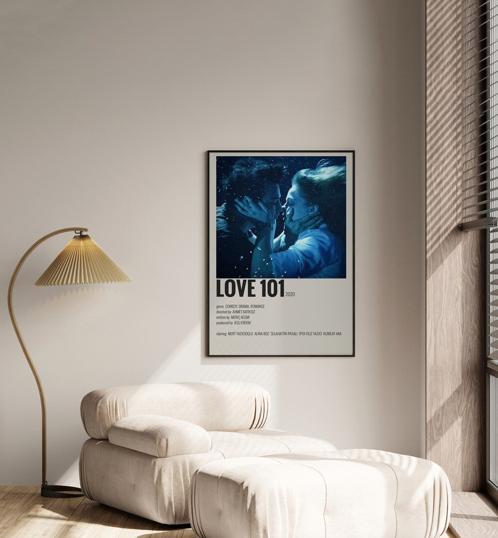 Love 101 Movie Posters in Black Plain Frame placed on a white wall beside a window and behind a sofa