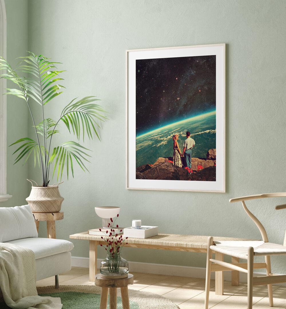 Love By Frank Moth Surreal Art Prints Surrealism in White Frame With Mount placed on a wall behind a table beside a plant