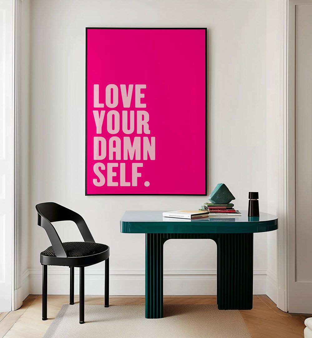 Love Your Damn Self by Athene Fritsch Quotes and Typography Posters in Black Plain Frame placed on a wall behind a study table