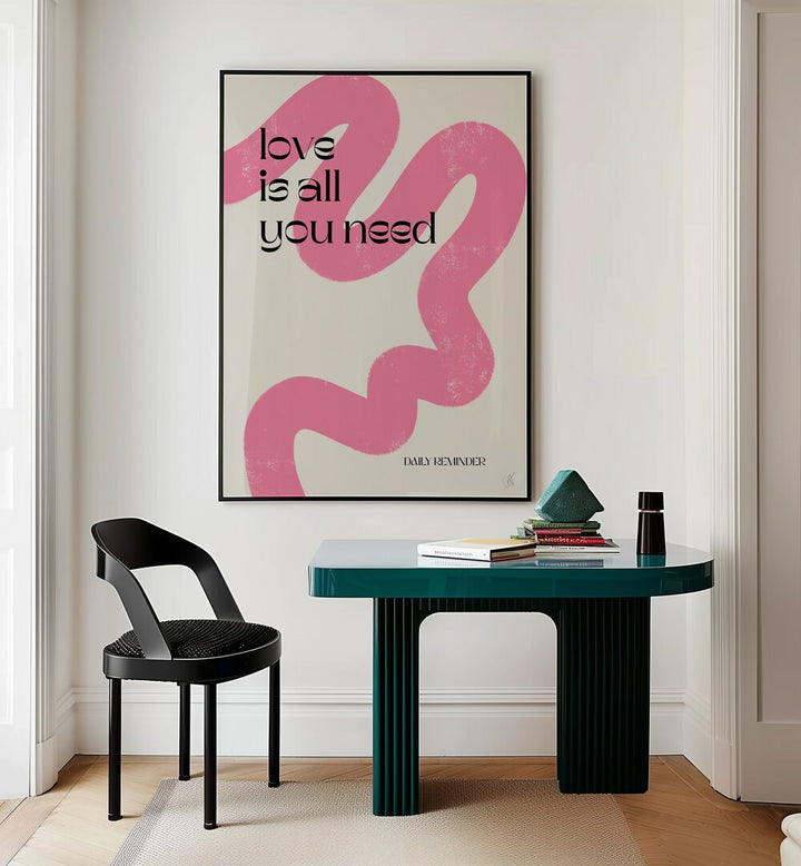 Love is All You Need by Anne-marie Volfova Quotes and Typography Posters in Black Plain Frame placed on a wall behind a study table