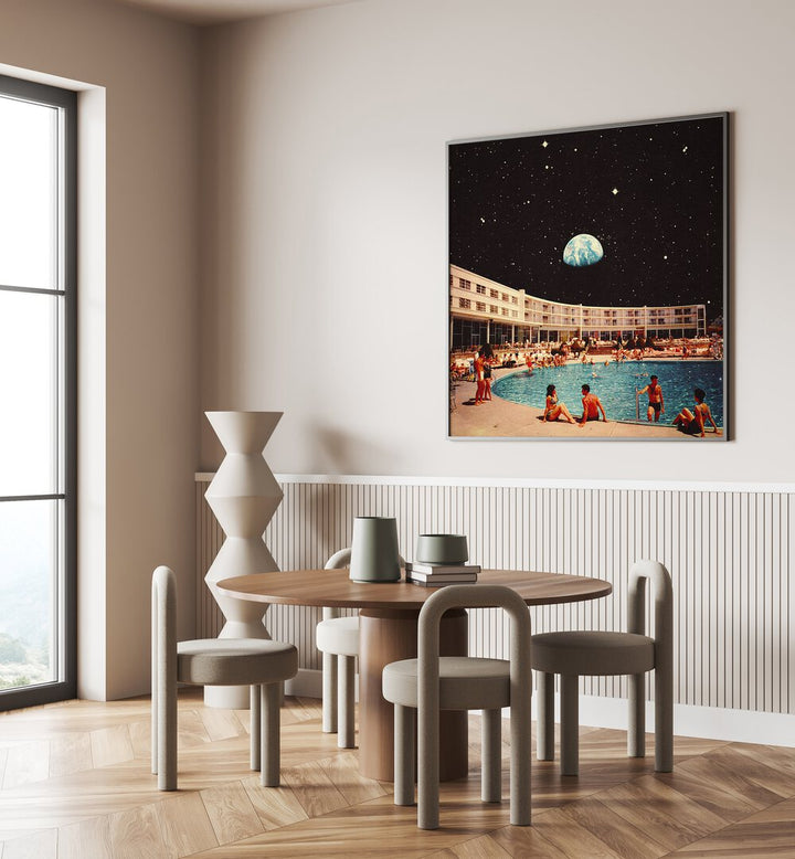 Lunar Pool Surreal Paintings Surreal Art Prints in Black Plain Frame placed on a White Colored Wall near a Coffee Table in the Dining Room