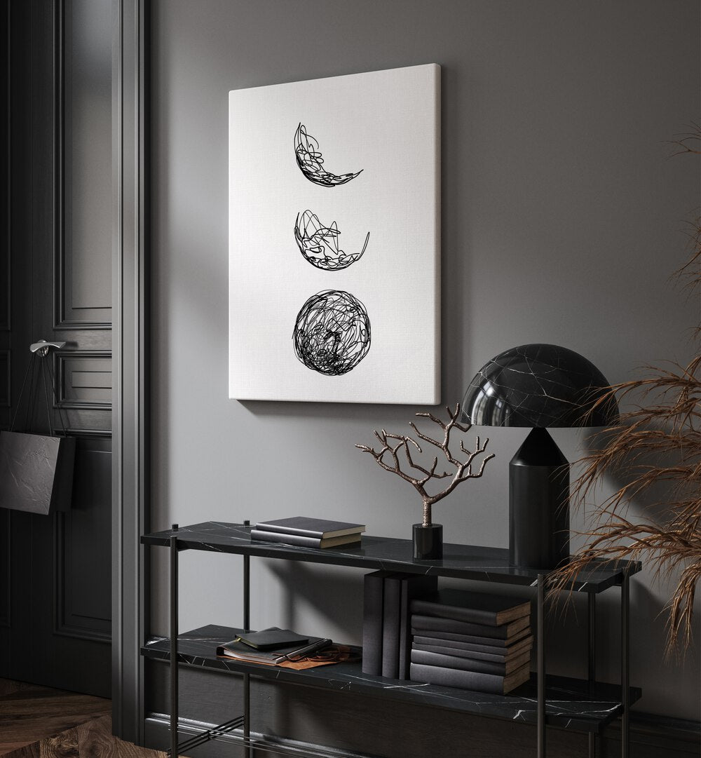 Lunar by Hanna Lee Tidd Line Art Paintings Line Art Prints in Gallery Wrap placed on a wall behind a table and beside a door