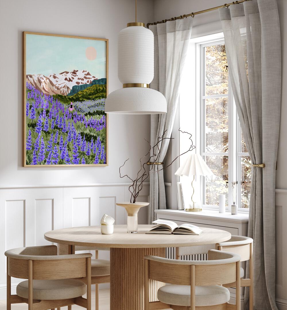 Lupine By Sarah Gesek Landscape Art Prints in Oak Wood Plain Frame placed on a wall behind a dining table and beside a window for dining area