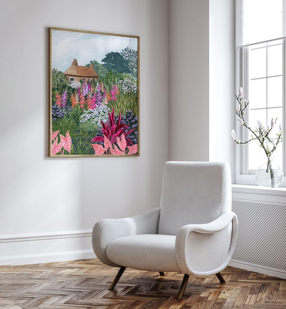 Lush Garden By Sarah Gesek Landscape Art Prints in Oak Wood Plain Frame placed on a white wall beside a chair and a window