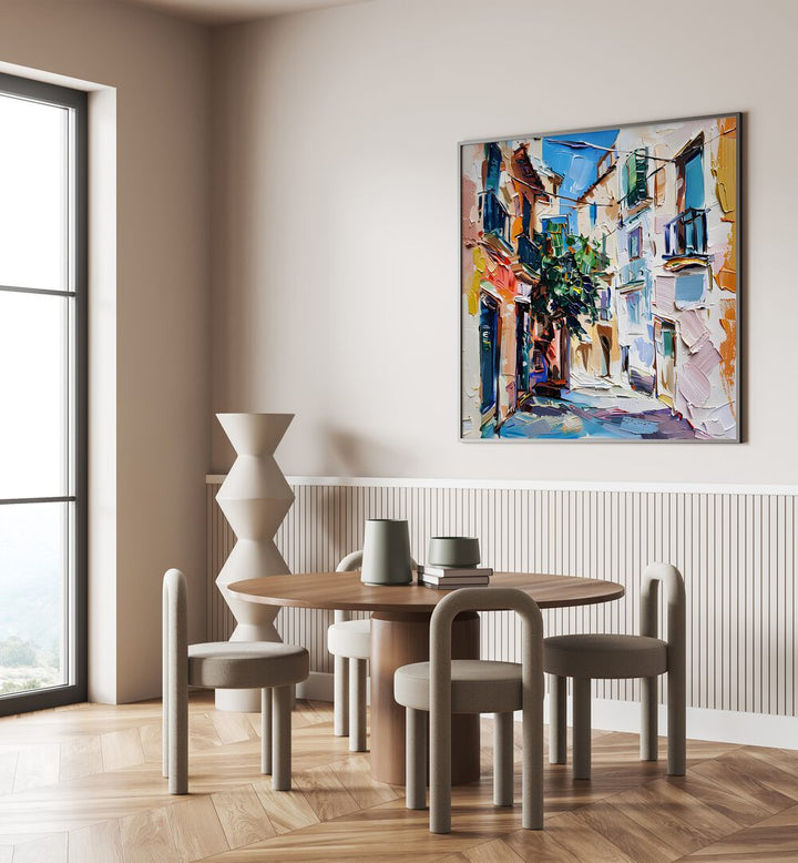 Elegant dining space featuring the MALLORCA STREET artwork, showcasing vibrant colors and charming street views.