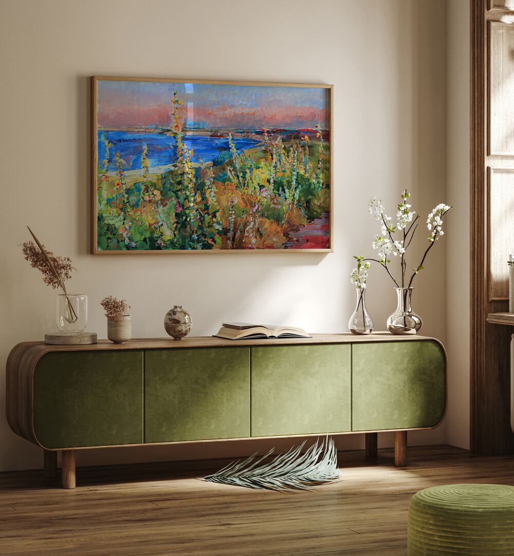 Colorful landscape painting titled "MALLOWS BY THE SEA," brightening a cozy interior space with a beachside vibe.