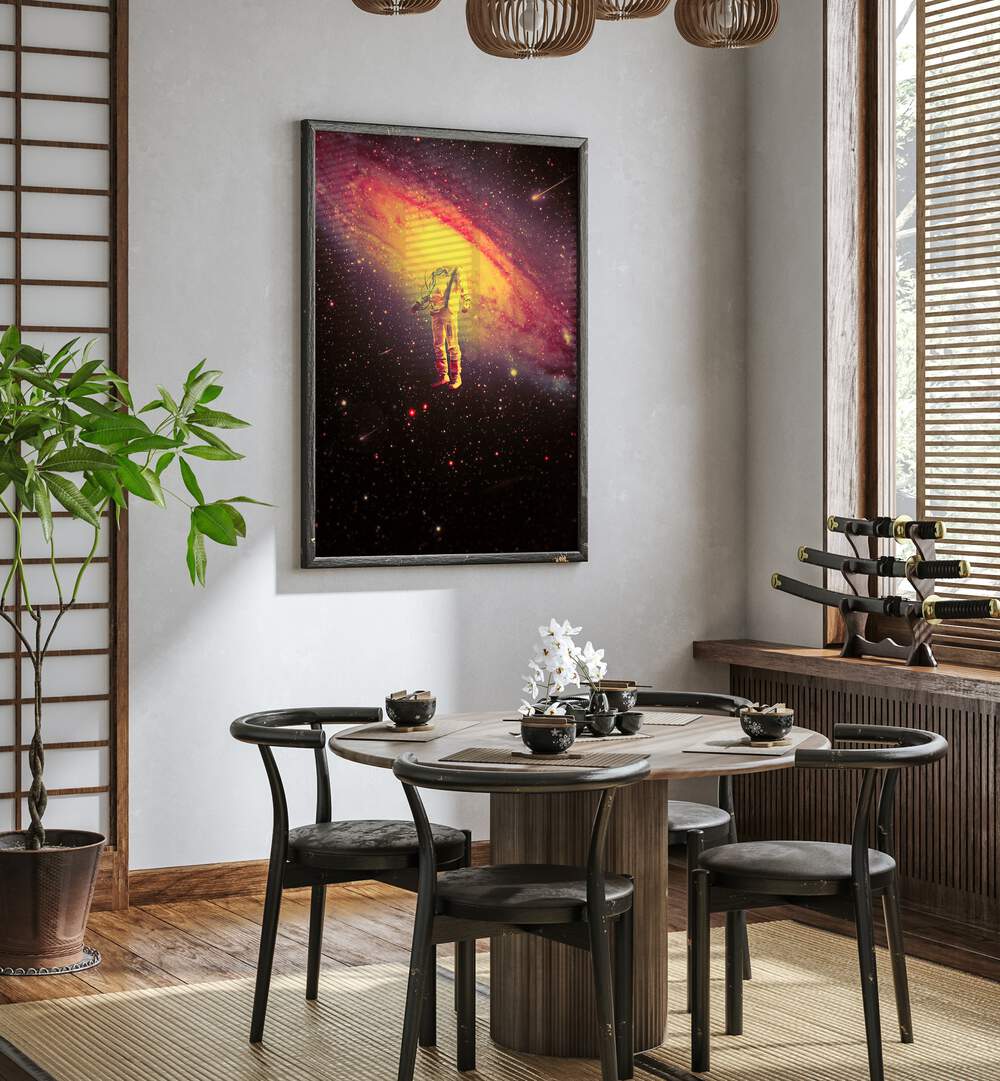 Mr. Galaxy By Francis Minoza Astronaut & Nasa Paintings, Space Art Prints Artwork in Black Plain Frame placed on a White Colored Wall near a Dining Table in the Dining Room
