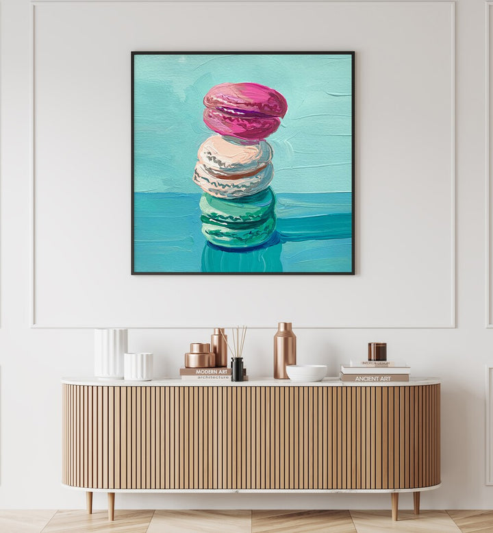 Macarons By Key And Sea Creative Bar and Cafe Artwork in Black Plain Frame on a white wall above a console table