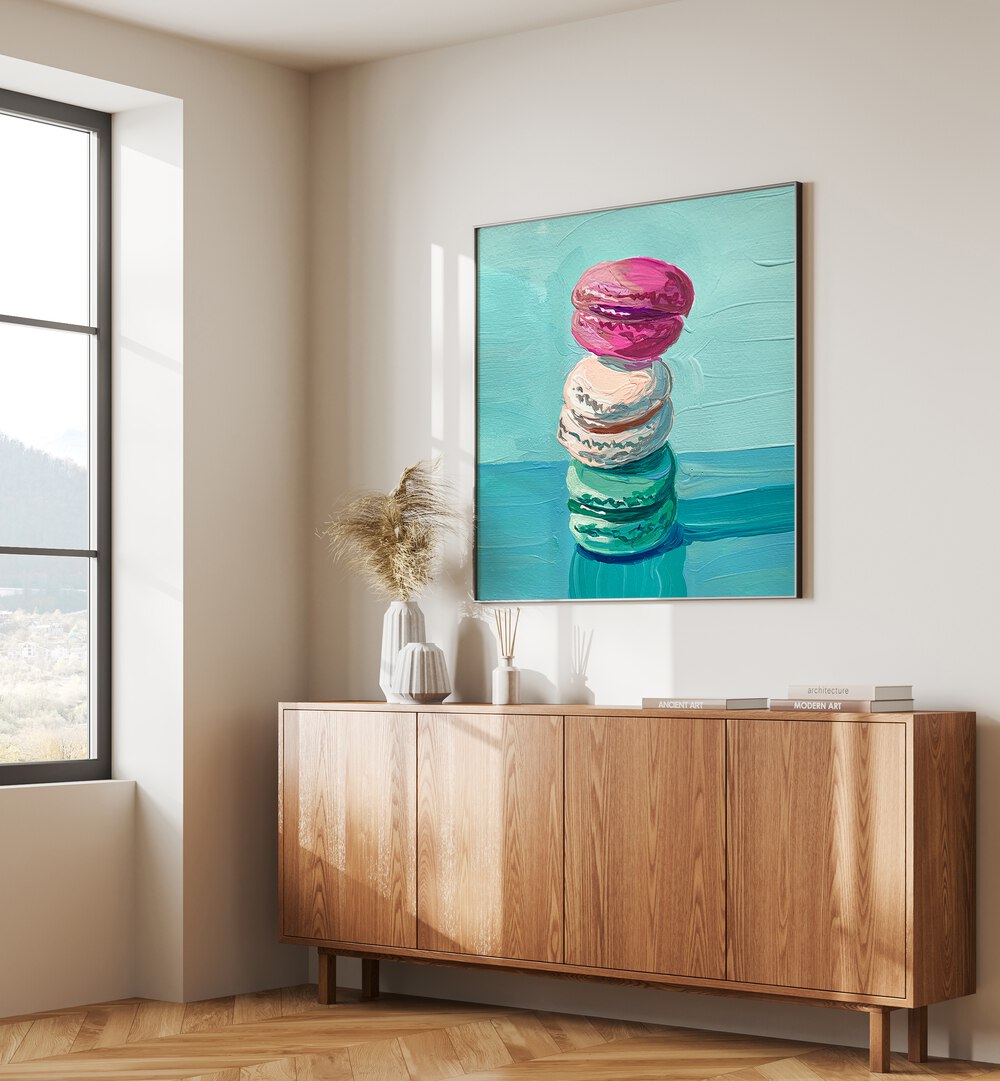 Macarons By Key And Sea Creative Bar and Cafe Artwork in Black Plain Frame on a white wall above a console table