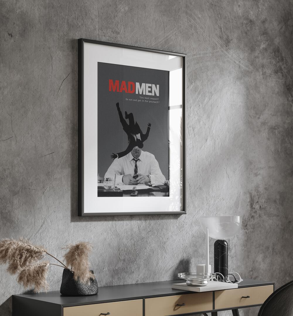 Mad Men By Grishma Korjani Movie Posters in Black Frame With Mount placed on a Grey Colored Wall in the Drawing Room