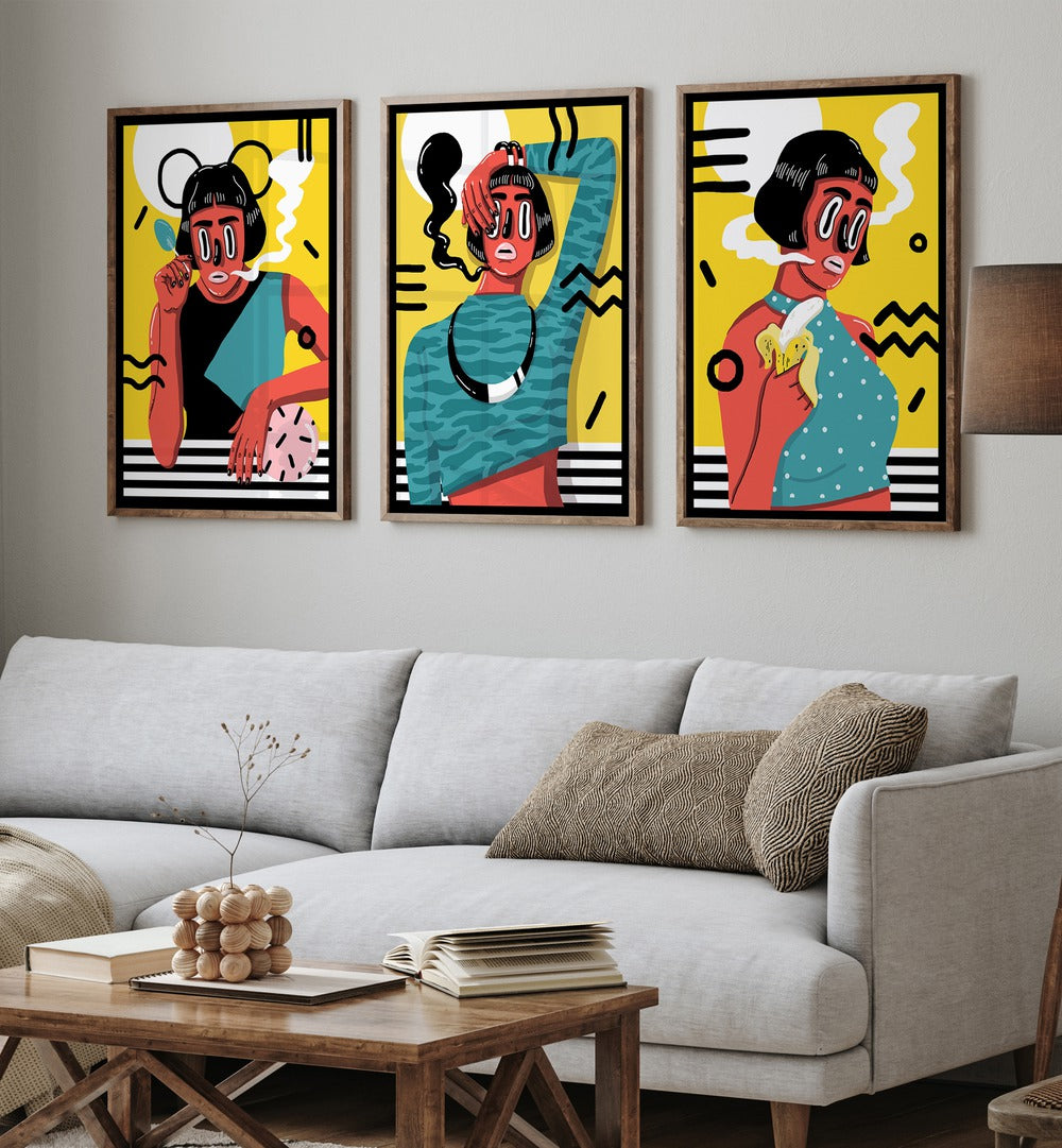 Madame X Framed Art Set Set Of 3 Paintings in Dark Wood Plain Frame placed on a white wall behind a sofa