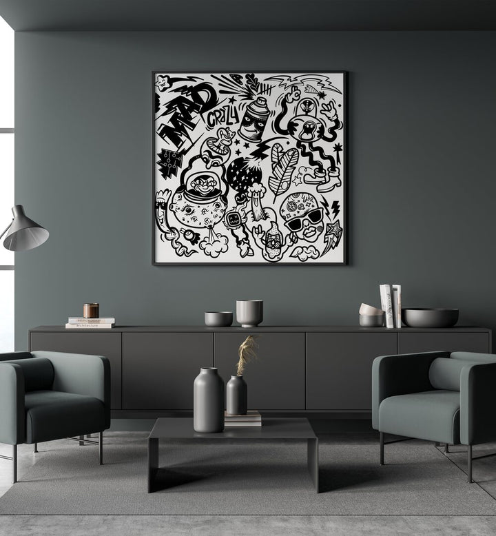 Madness Unboxed Doodle Art Painting in Black Plain Frame places on wall behind a black table