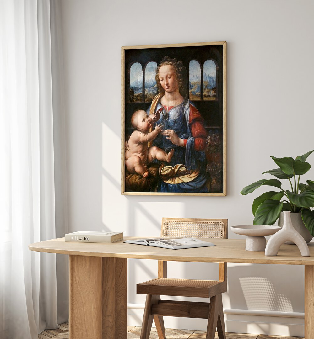 Madonna Of The Carnation 1470s Vintage Paintings in Oak Wood Plain Frame placed on a white wall behind a study table