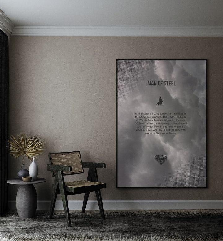 Man Of Steel By Grishma Korjani Movie Posters in Black Plain  Frame placed on a Beige Colored Wall in the Drawing Room