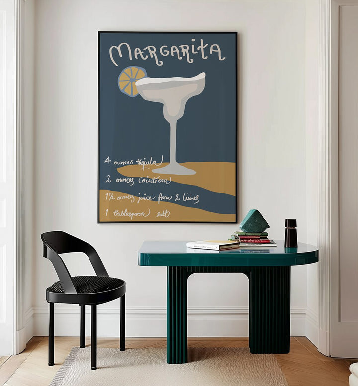 Margarita By 1 X Studio Cafe Art Prints Cafe Posters in Black Plain Frame placed on a Cream Colored Wall near a Table in a Workspace in the Drawing Room