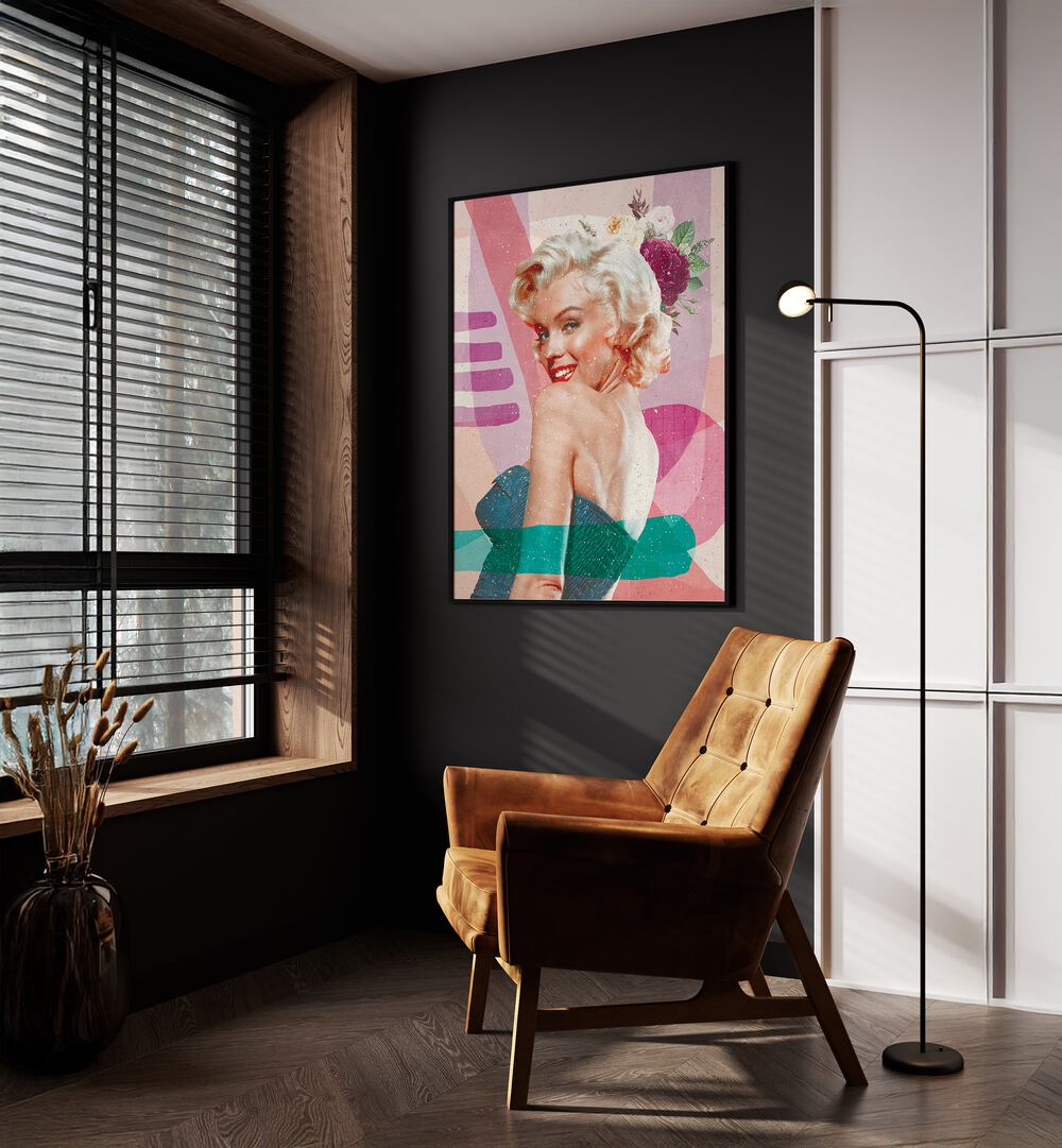 Marilyn Is Back Portraits and Figurative Illustrations in Black Plain Frame placed on a Dark Grey Colored Wall near a Brown Sofa Chair in the Drawing Room