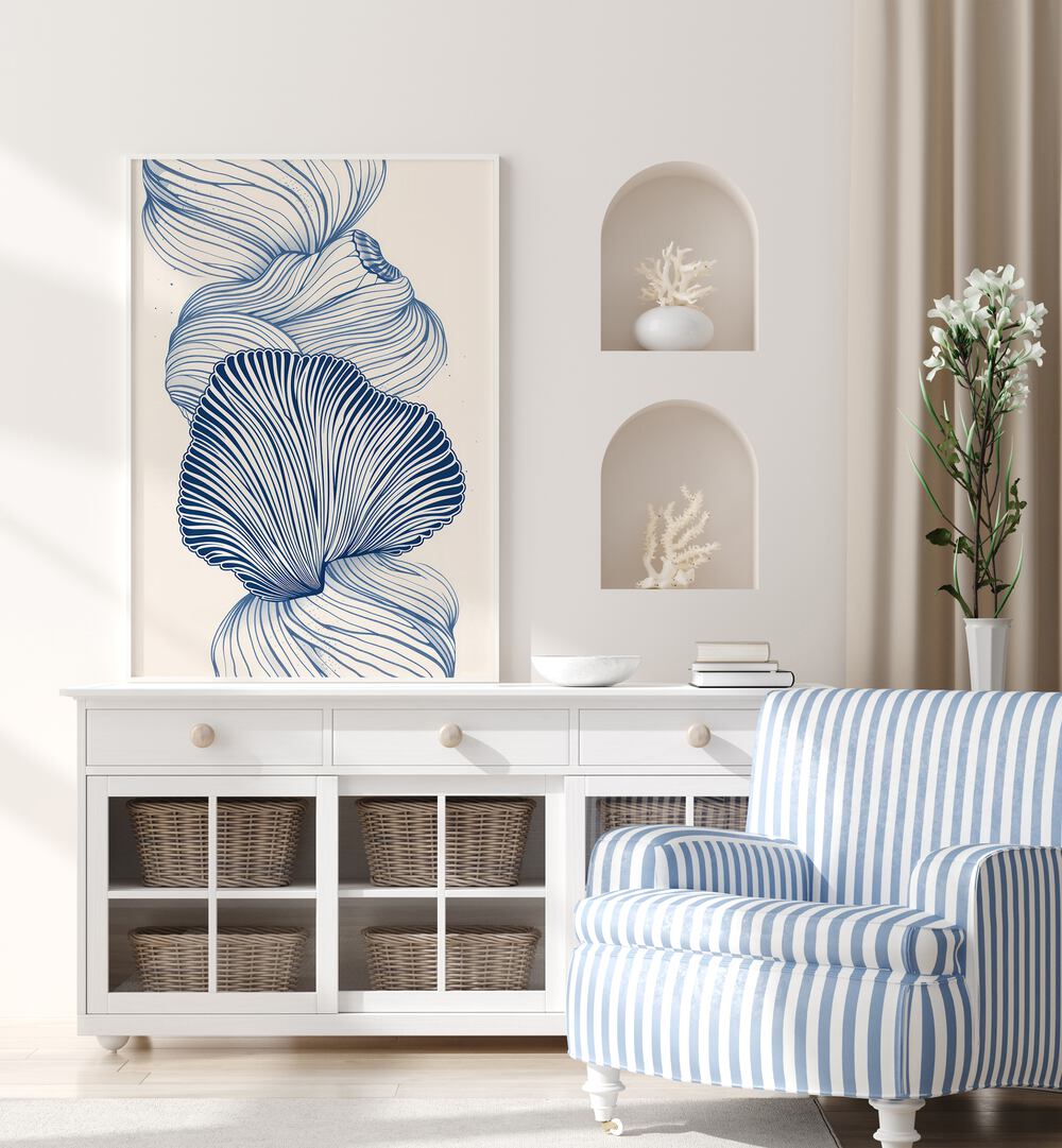 Marine Mosaics Beach Prints Coastal Wall Art in White Plain Frame placed on a white table beside a sofa