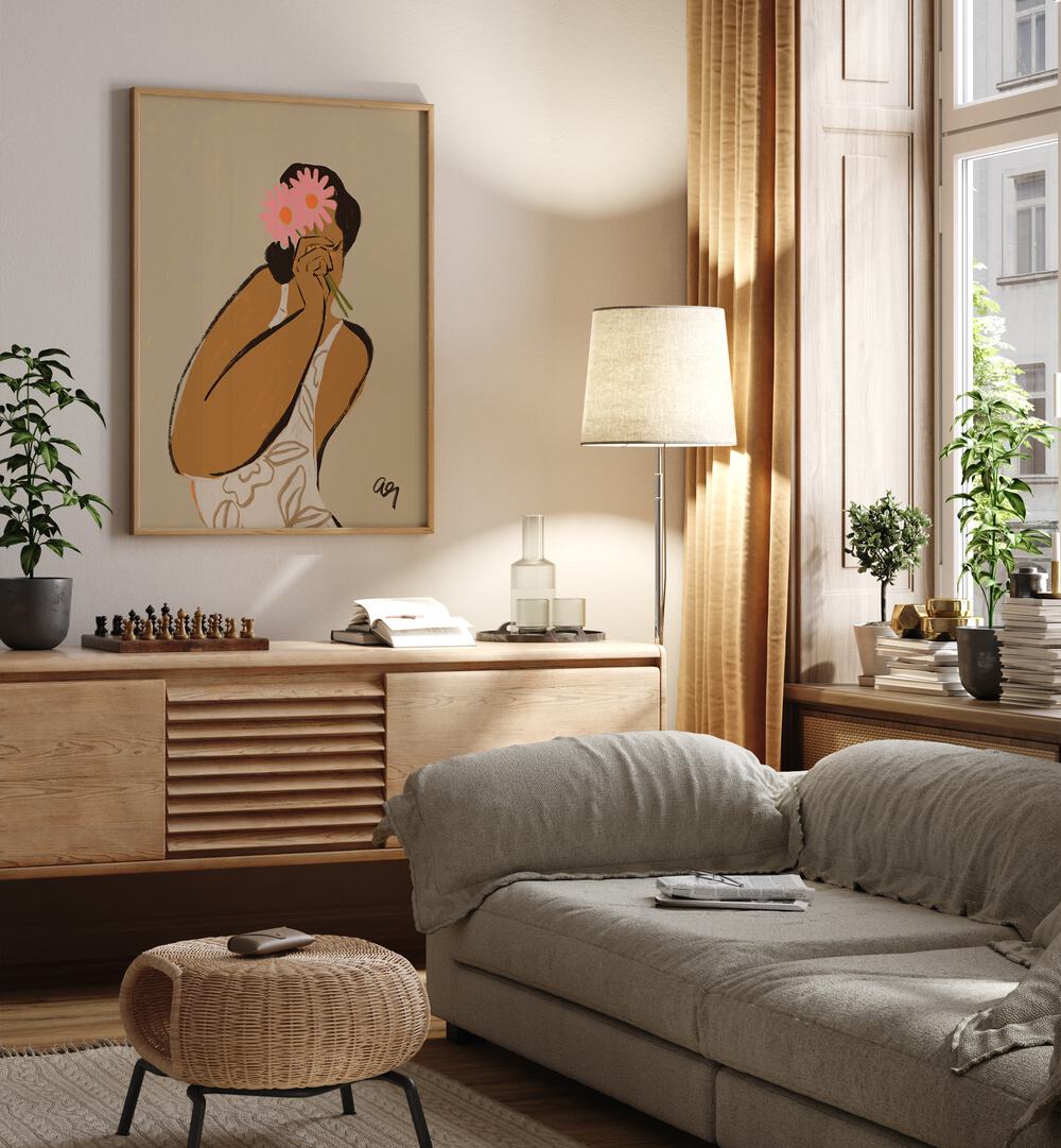 Mask By Arty Guava Wall Art Prints in Oak Wood Plain Frame placed on a Cream Colored Wall above a Console Table near a Grey Sofa  in the Living Room