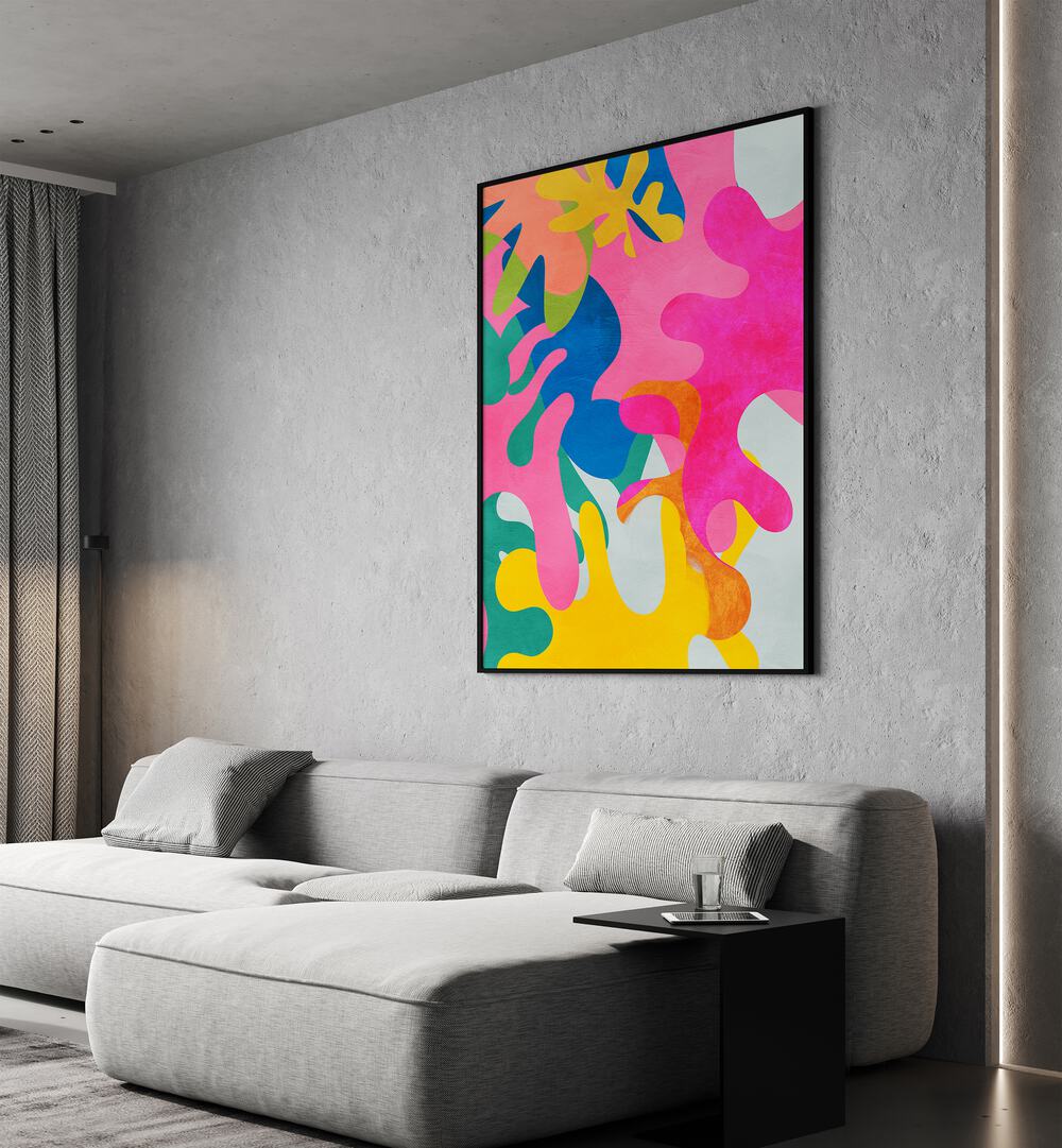 Matisse Inspired Cut Out By Ana Rut Bre Landscape Art Prints in Black Plain Frame placed on a Grey Colored Wall near a Grey 
 Sofa in the Living Room