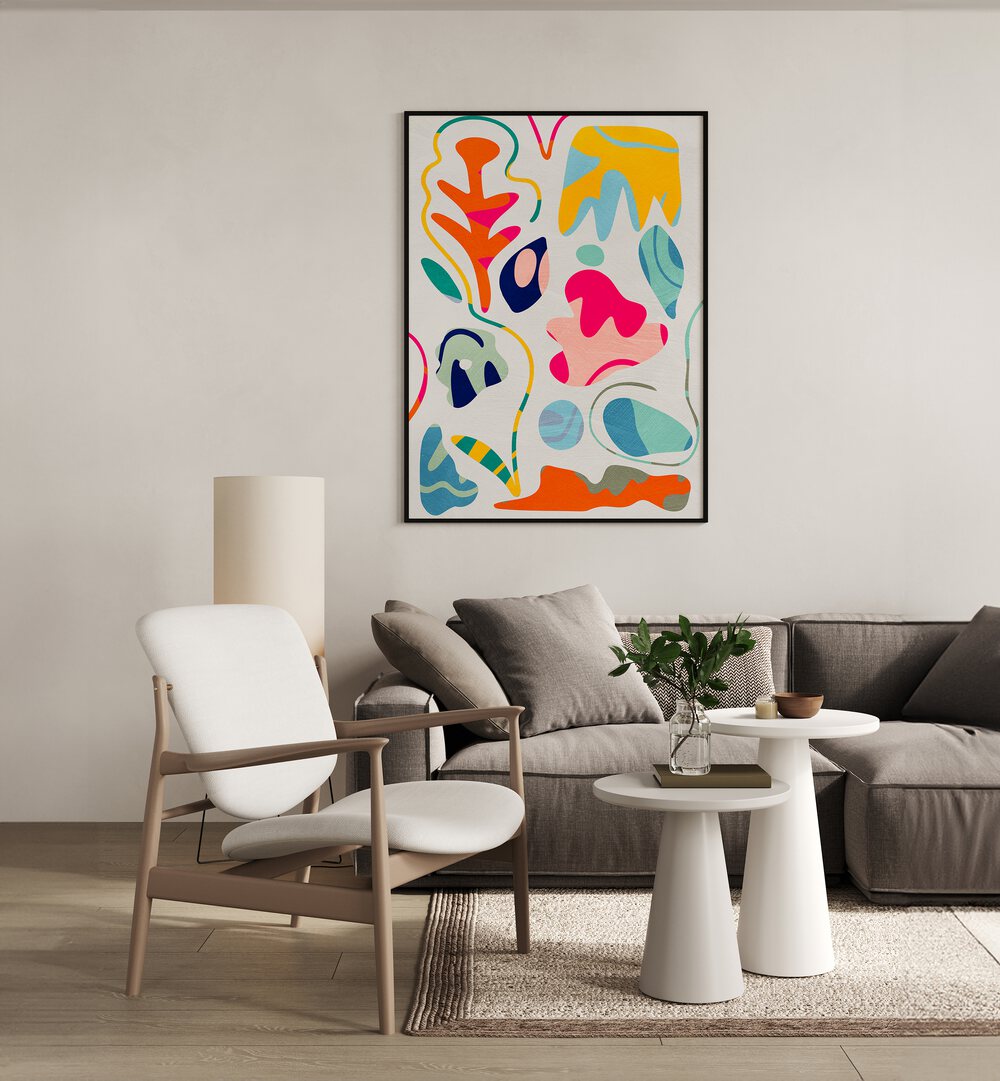 Matisse Inspired Shapes By Ana Rut Bre Landscape Art Prints in Black Plain Frame placed on a Cream Colored Wall in the Living Room