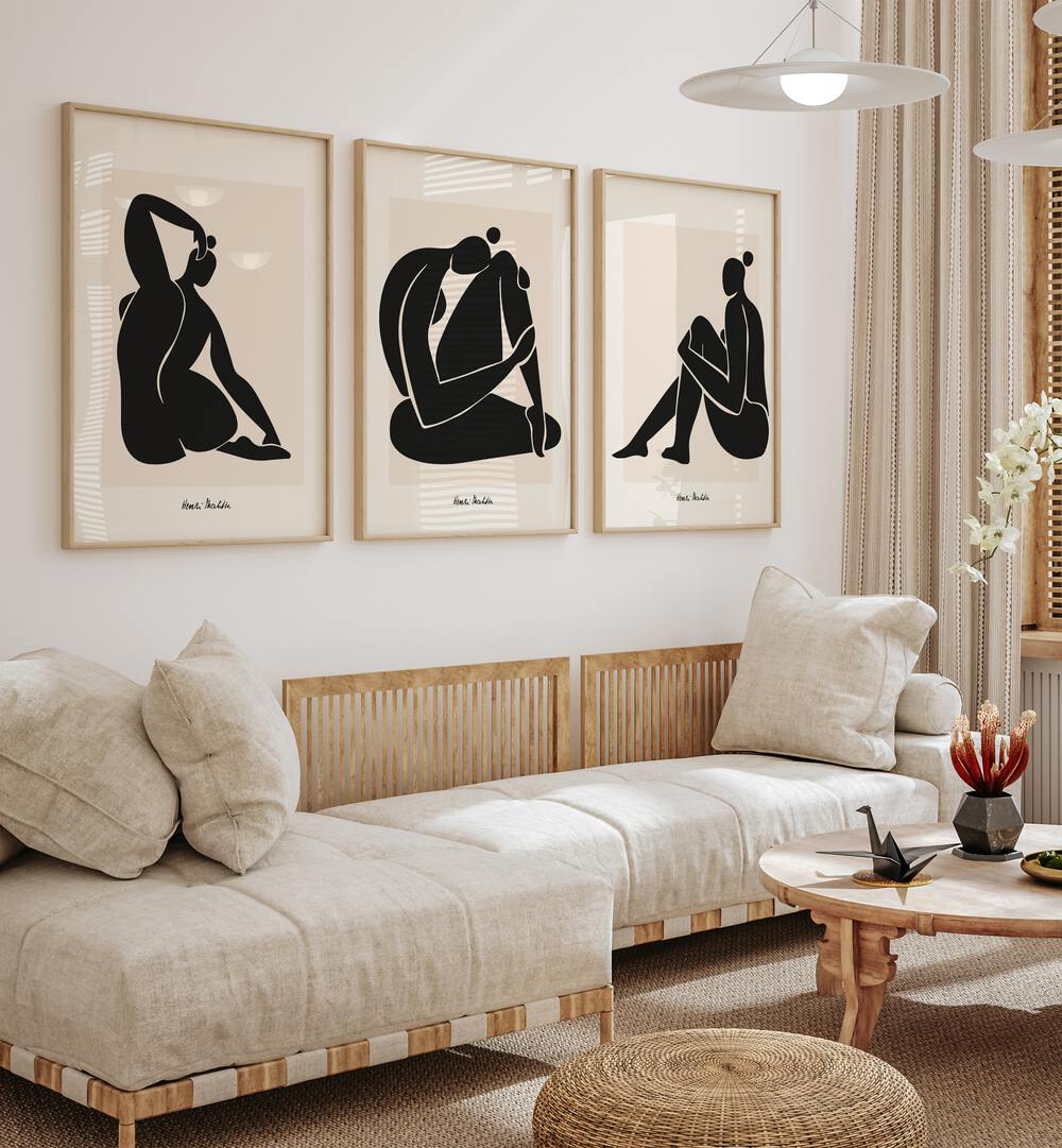 Matisse Set Set Of 3 Paintings in Oak Wood Plain Frame placed on a wall living room wall behind a sofa