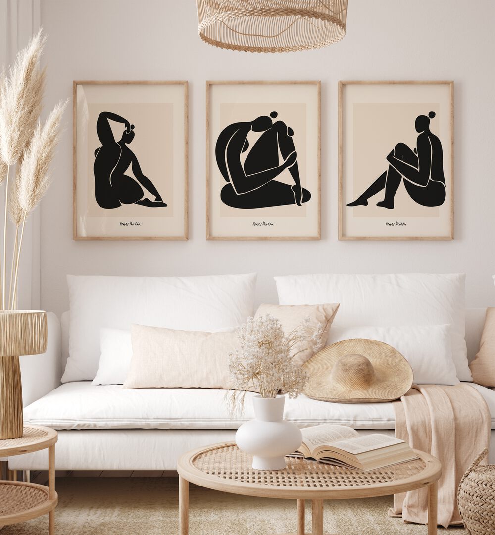 Matisse Set Set Of 3 Paintings in Oak Wood Plain Frame placed on a wall living room wall behind a sofa