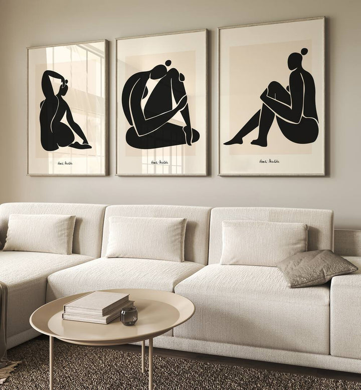 Matisse Set Set Of 3 Paintings in Oak Wood Plain Frame placed on a wall living room wall behind a sofa