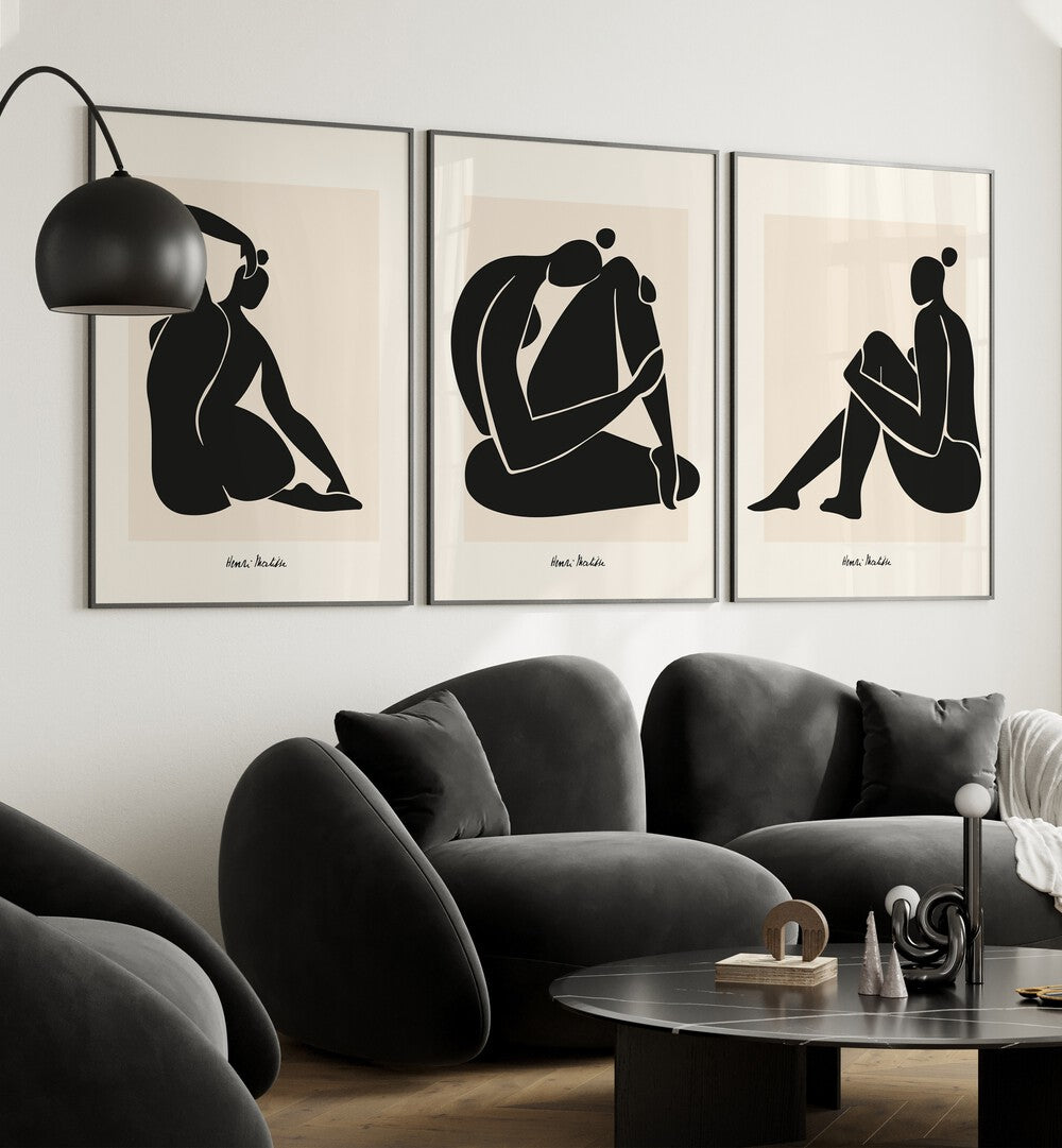 Matisse Set Set Of 3 Paintings in Black Plain Frame placed on a wall living room wall behind a sofa