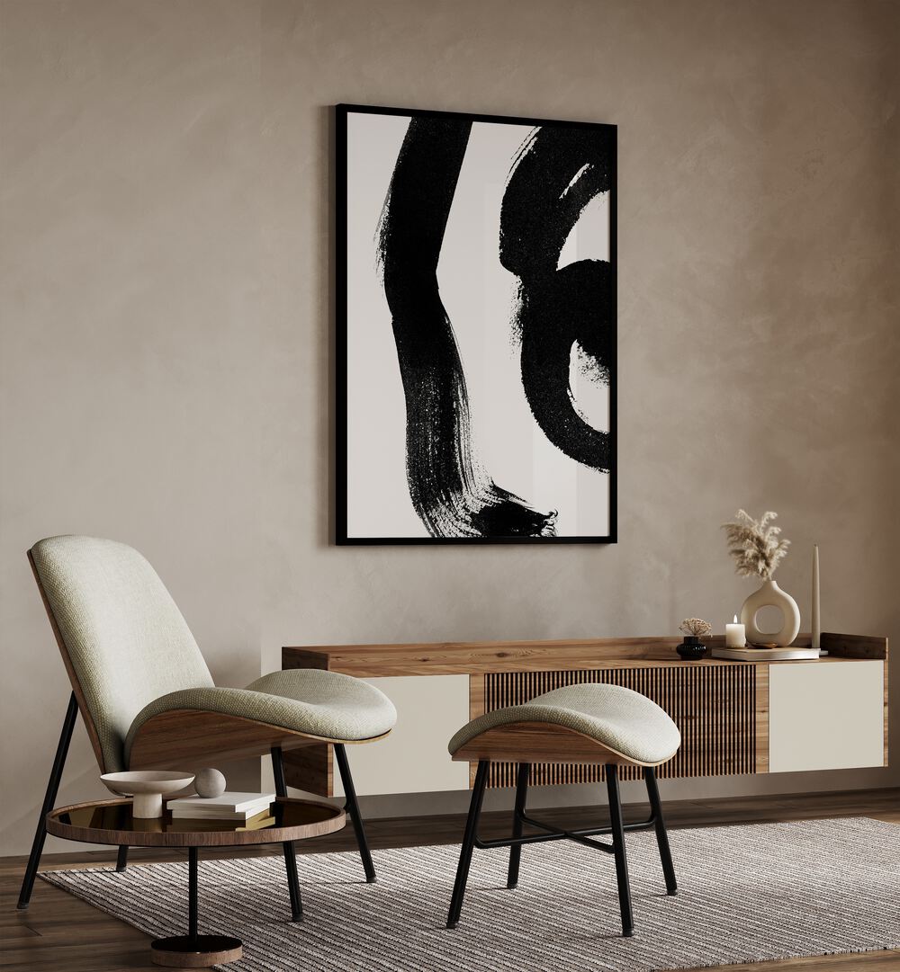 Maybe Abstract Paintings Abstract Art Prints in Black Plain Frame placed on a Beige Colored Wall above a Console Table in the Drawing Room