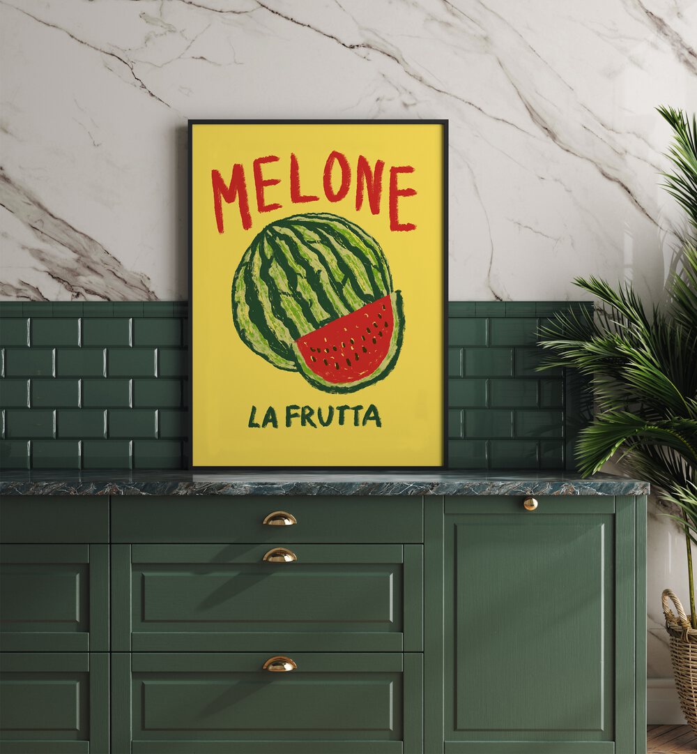 Melone Lafrutta by Studio Dolci Kitchen Art Prints in Black Plain Frame placed on a kitchen counter for kitchen