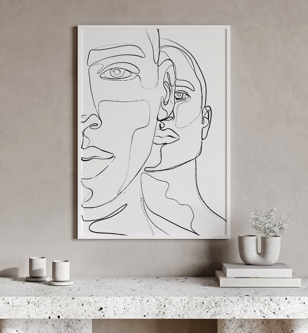 Men by Treechild Line Art Paintings in White Plain Frame on a wall above a study table